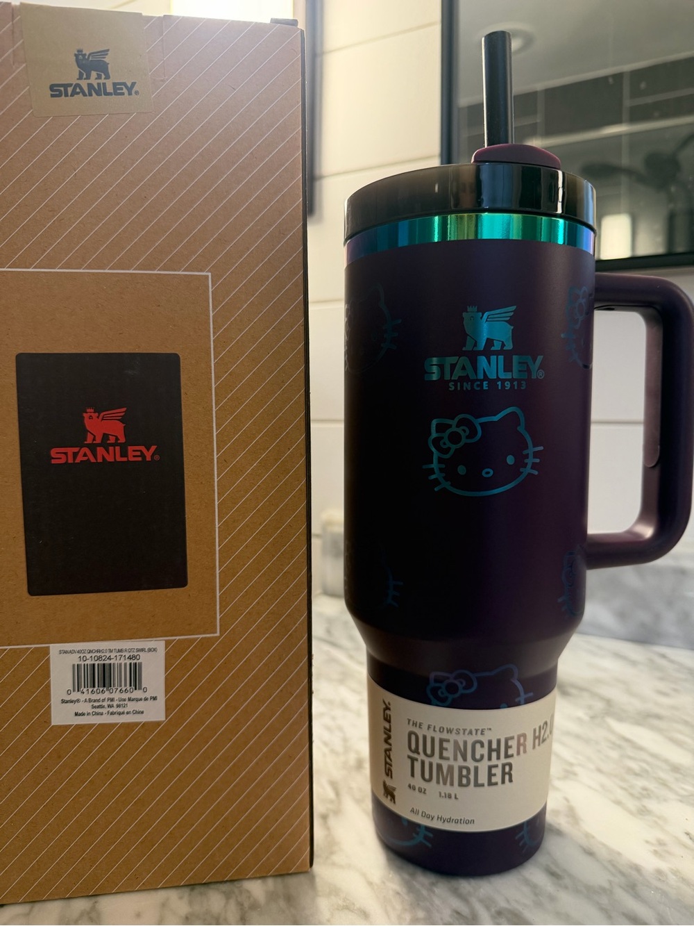Stanley Purple Hello Kitty Quencher Tumbler with Teal Accents